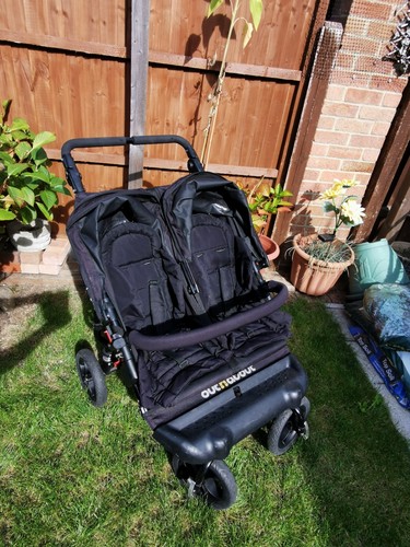 Out about double pushchair - n,